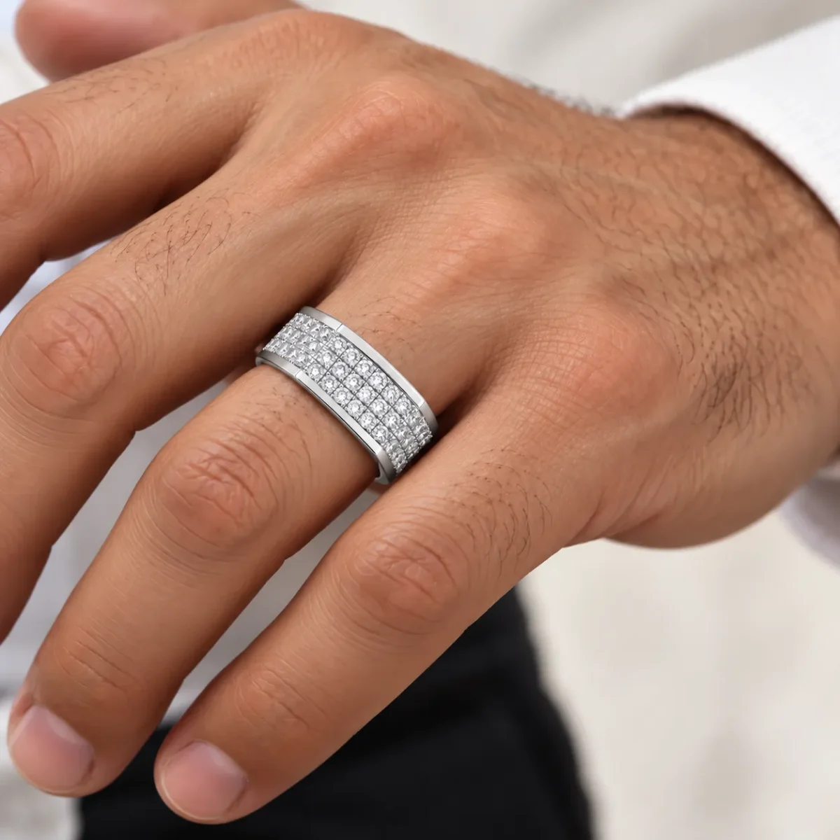 Royal Matrix Moissanite Diamond Men's Ring in 925 Sterling Silver worn on a male model's finger, featuring three rows of brilliant round-cut Moissanite stones.