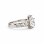 Right side view of Pear Cut Moissanite Diamond Ring in 925 Sterling Silver with prong-set centre stone and round side accents.
