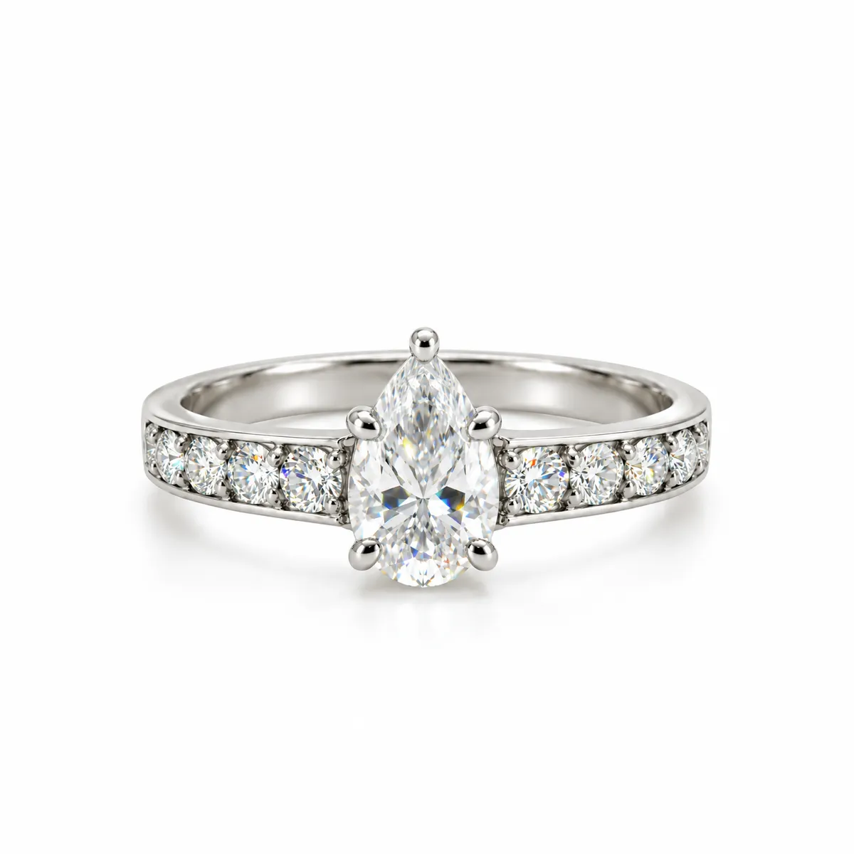 Smaller ring on white background Front view of Pear Cut Moissanite Diamond Ring in 925 Sterling Silver with brilliant pear-shaped centre stone and sparkling side stones.
