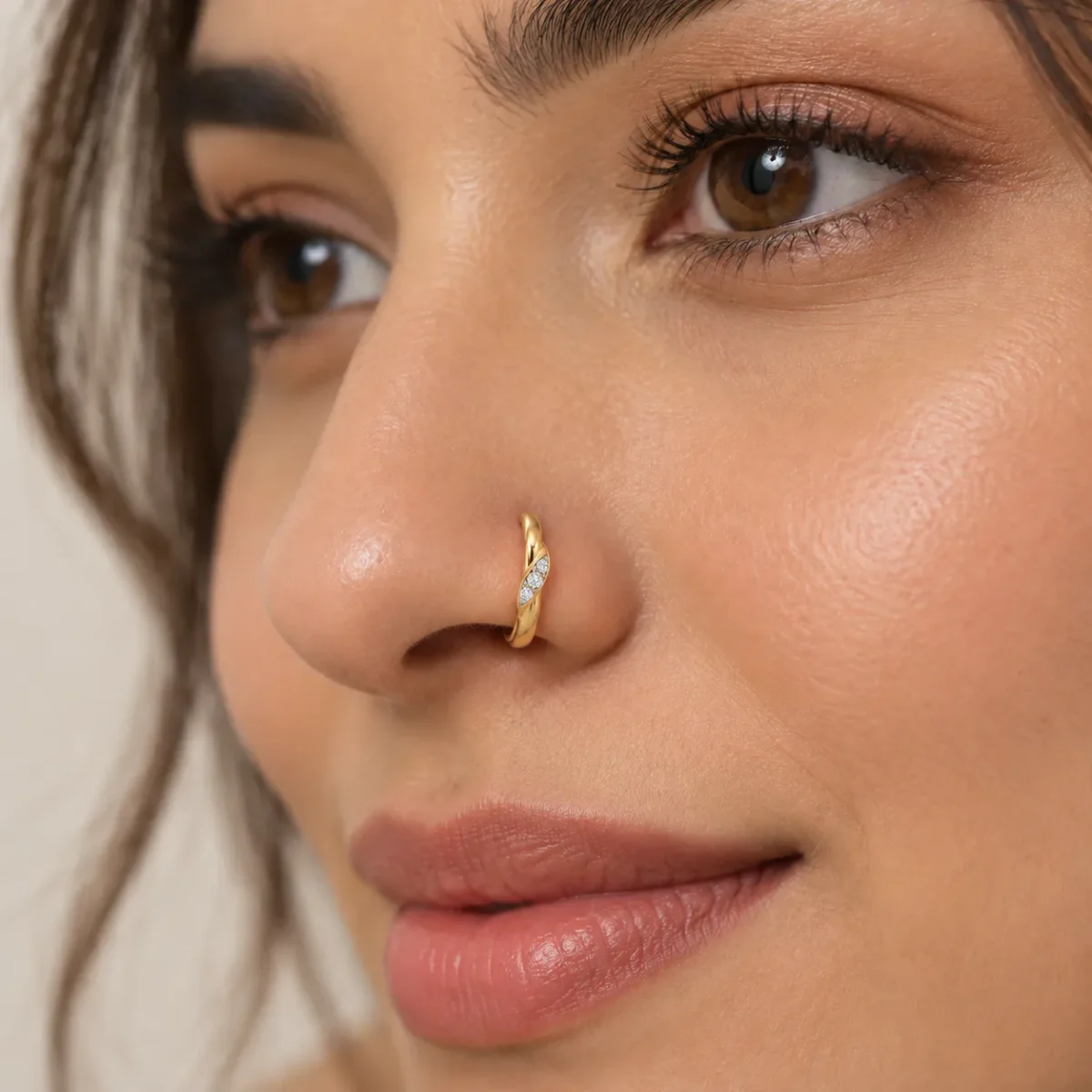Woman wearing Twist Trio Lab Grown Diamond Nose Ring in yellow gold