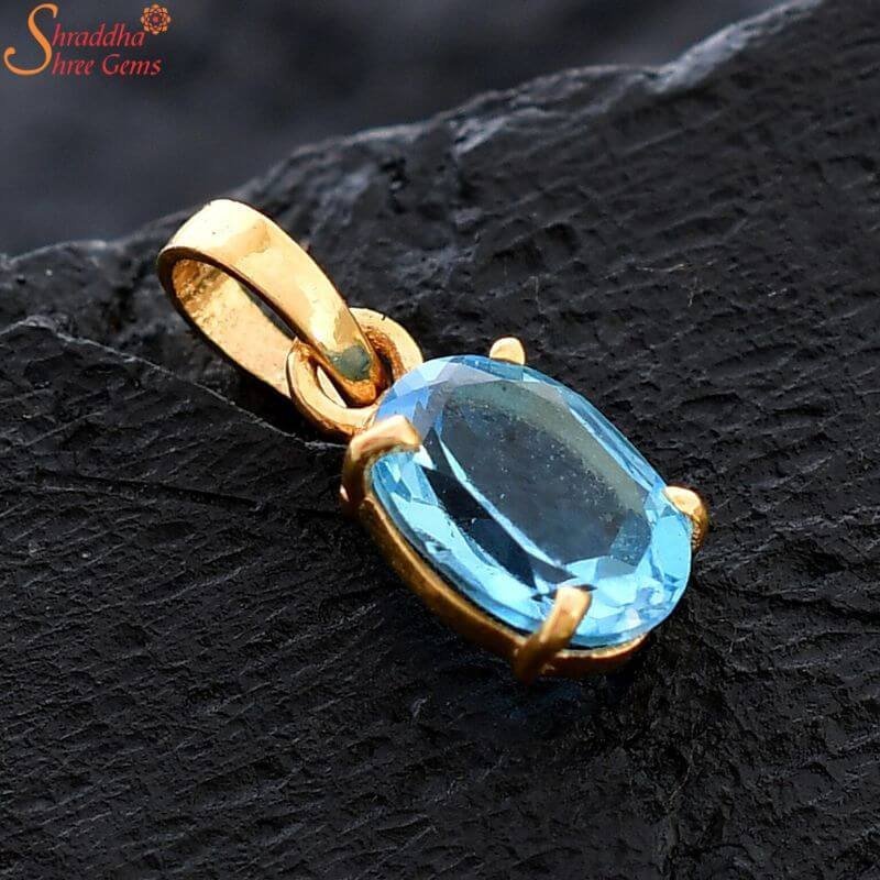 oval-blue-topaz-panchdhatu-pendant.jpg Natural Oval Blue Topaz Panchdhatu Pendant - Image 1